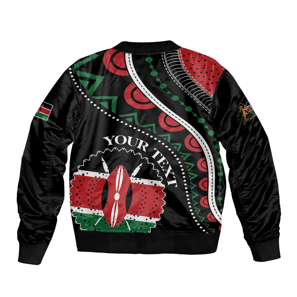 Black bomber jacket with colorful African graphic print panel, ribbed hem