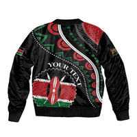 Black bomber jacket with colorful African graphic print panel, ribbed hem