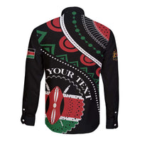 Black long-sleeve button shirt with large circular African graphic and sleeve flag details