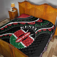 Black Kenya quilt with large red star flower, green accents, and white wavy stripe bands