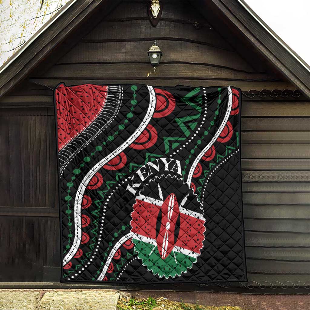 Black quilt panel with Kenya text, red star emblem, and green arrow details in border