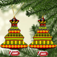 Ceramic bell-shaped Christmas ornaments with Hawaiian quilt pattern, red/yellow/green, hanging loop