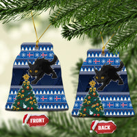 Blue ceramic Christmas tree-shaped ornament with black cat and decorated tree, gold string