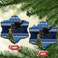 Blue ceramic heart-shaped Christmas ornaments with black cat and decorated tree, gold strings