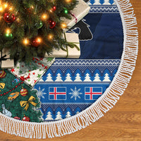 Blue circular Christmas tree skirt with yule cat, Xmas tree, and white tassel fringe