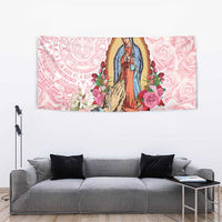 Pink floral Virgin of Guadalupe tapestry on wall with rose roses and decorative motif