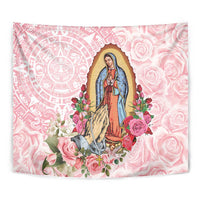 Pink Virgin of Guadalupe tapestry close-up with rose pattern and Aztec-style circular emblem