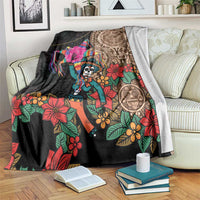 Black blanket with colorful Mexican skeleton, flowers, and Aztec-style circle artwork