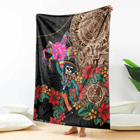 Black Mexican blanket featuring skeleton figure, tropical flowers, and large Aztec circle panel