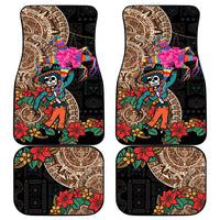 Four black car floor mats with colorful skull and pinata Aztec-style circular designs