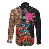 Black long sleeve button shirt with colorful skull pinata graphic and Aztec patterns