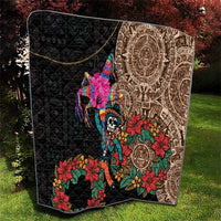 Black quilt blanket with brown Aztec circle print, skull dancer, and bright flowers