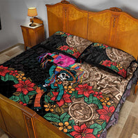 Black quilt bed set with skull character, rainbow tassels, and red floral accents