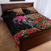 Black quilt bed set with Aztec border patterns, colorful flowers, and central skull artwork