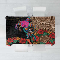 Black tablecloth with colorful Aztec-style skull, flowers, and geometric patterns