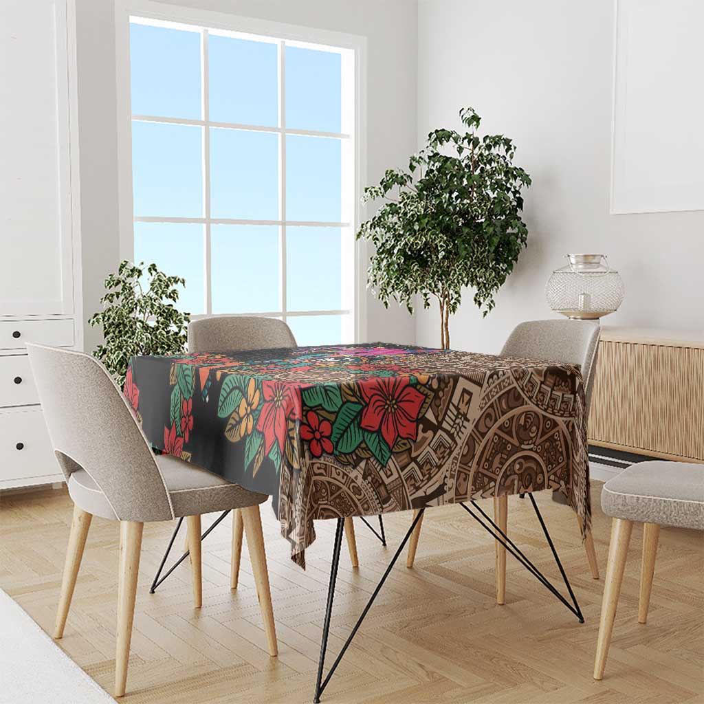 Black tablecloth with multicolor floral and Aztec geometric patterns on dining table