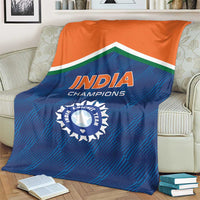 India cricket champions blanket on an armchair, blue-and-orange graphic with 'INDIA' emblem
