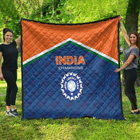India Champions quilt spread outdoors, orange and blue panels with flag border and cricket emblem.