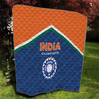 India Champions quilt with orange upper section and blue lower section, diamond quilting texture.