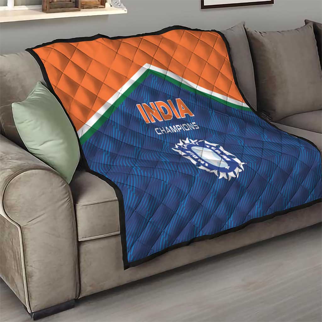 India Champions quilt draped over a sofa, orange and blue panels with cricket logo.