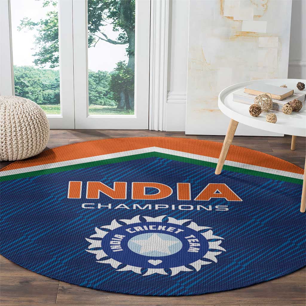 Blue circular cricket rug with orange-green border stripe and India Champions text and logo