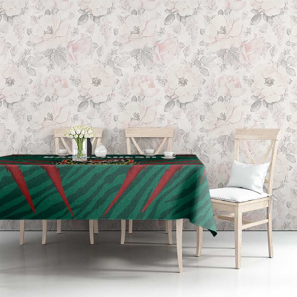 Green and red Tigers tablecloth on rectangular table with printed emblem and stripes