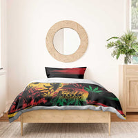 Black Marley duvet with One Love text, lion and cannabis leaf graphics in green and red