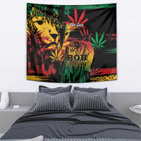 Tapestry with Bob Marley portrait, 'One Love' and cannabis leaves, colorful grunge on dark fabric.