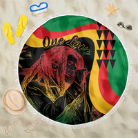 Round beach blanket with reggae lion portrait graphic and white fringe border