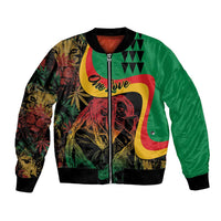 Green bomber jacket with full zip, colorful reggae graphic and black ribbed cuffs
