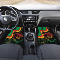 Car floor mat with reggae lion artwork in green, red, and yellow swirl design