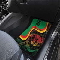 Car floor mat with reggae lion print, green background and yellow-red wave border
