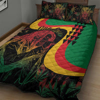 Quilt bed set with green red yellow black quilt, central face artwork and tropical leaf print