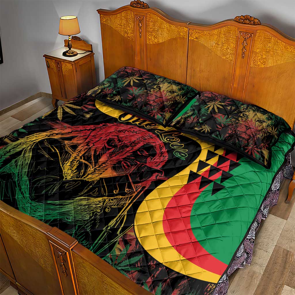 Quilt bed set with green, red, yellow and black quilt and pillows featuring face artwork