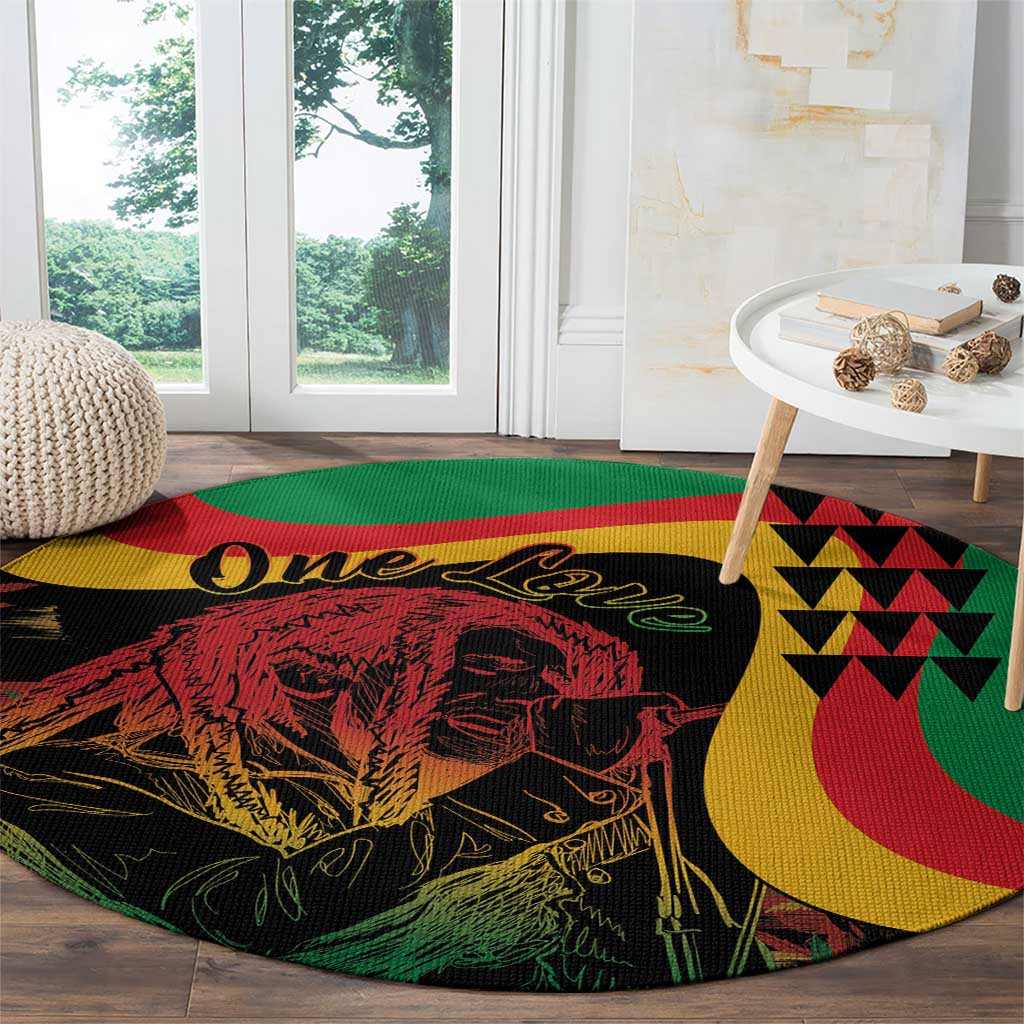Round reggae-themed area rug with lion graphic and One Love lettering in green-yellow-red colors