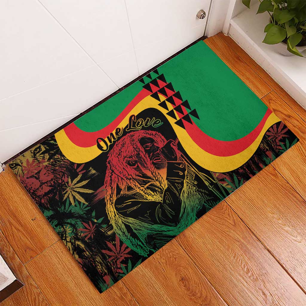 Green rubber doormat with One Love and Marley portrait, red and yellow curved bands