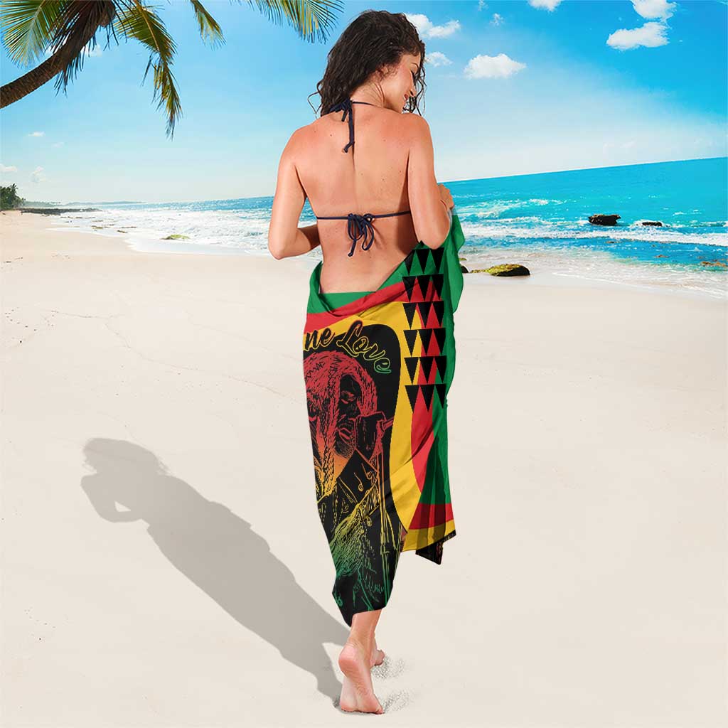 Green reggae sarong with One Love text and face portrait, tied wrap