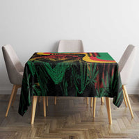 Green rectangular tablecloth with vibrant reggae lion and flame-style graphics