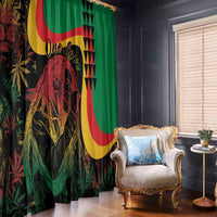 Reggae print window curtains in green with red, yellow, and black graphic face design