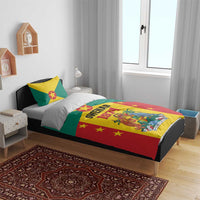 Flag-themed bedding set on a bed with green, yellow, red stars and GWENAD 1974 crest print