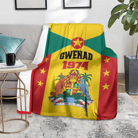 Grenada flag style fleece blanket with Gwenad 1974 crest and stars, draped on couch seat
