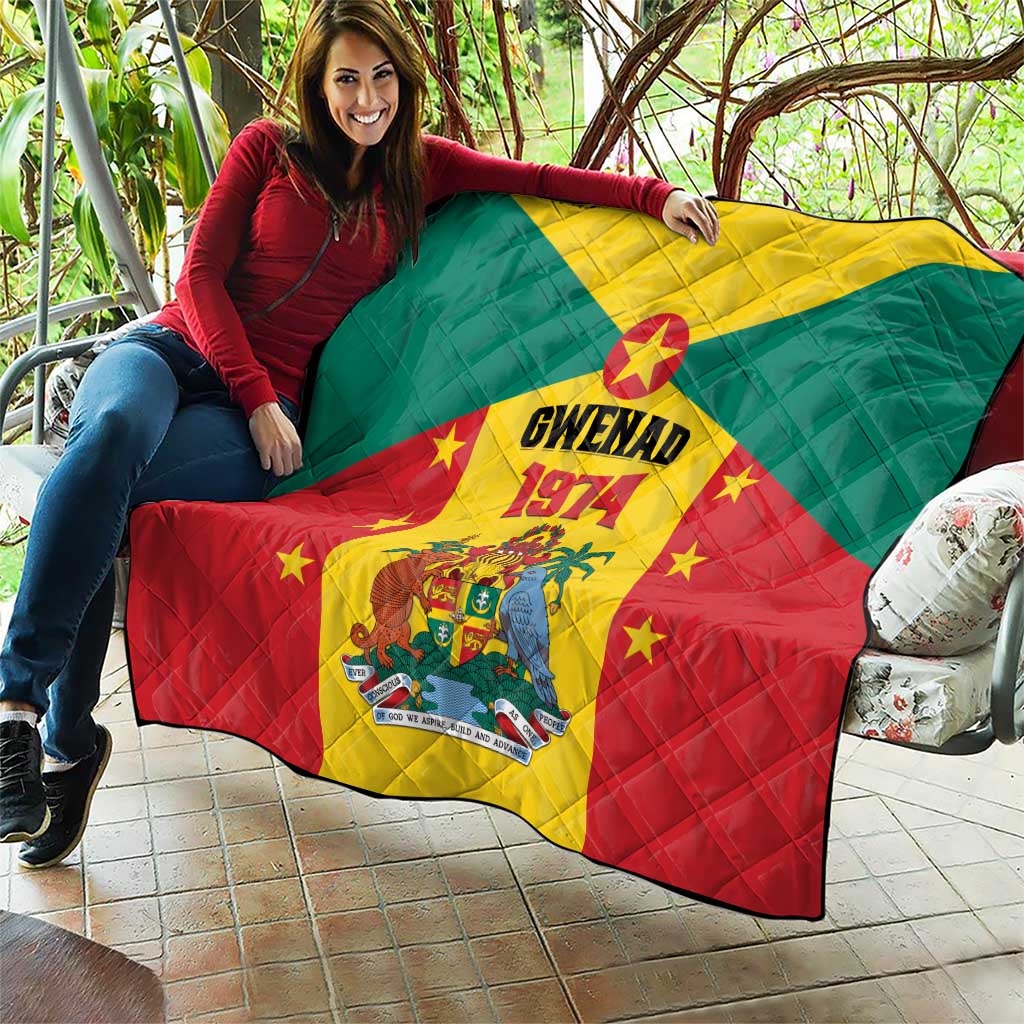 Grenada flag quilt draped on couch with Gwenad 1974 crest and stars, red yellow green.