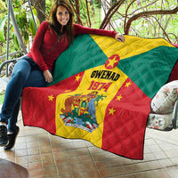 Grenada flag quilt draped on couch with Gwenad 1974 crest and stars, red yellow green.