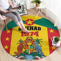 Round area rug on wooden floor with yellow, green, red flag design and GWENAD 1974 text