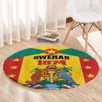 Round carpet on light wood floor with flag-style emblem, GWENAD 1974 numerals and stars