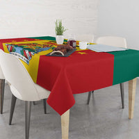 Grenada coat of arms tablecloth on a dining table with bold red, green, and yellow print