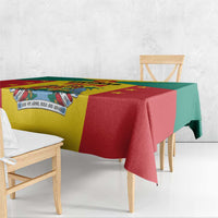 Close view of Grenada coat of arms tablecloth corner with red, yellow, and green colors