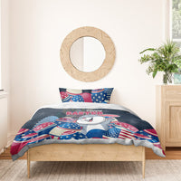 Blue duvet and pillow with smiling bunny, Happy Easter text, and patriotic egg designs