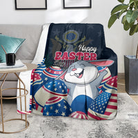 Blue “Happy Easter” bunny blanket on floor with patriotic egg pattern and stars
