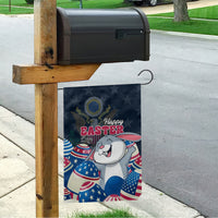 Blue Happy Easter garden flag hanging on porch post, featuring white bunny with stars